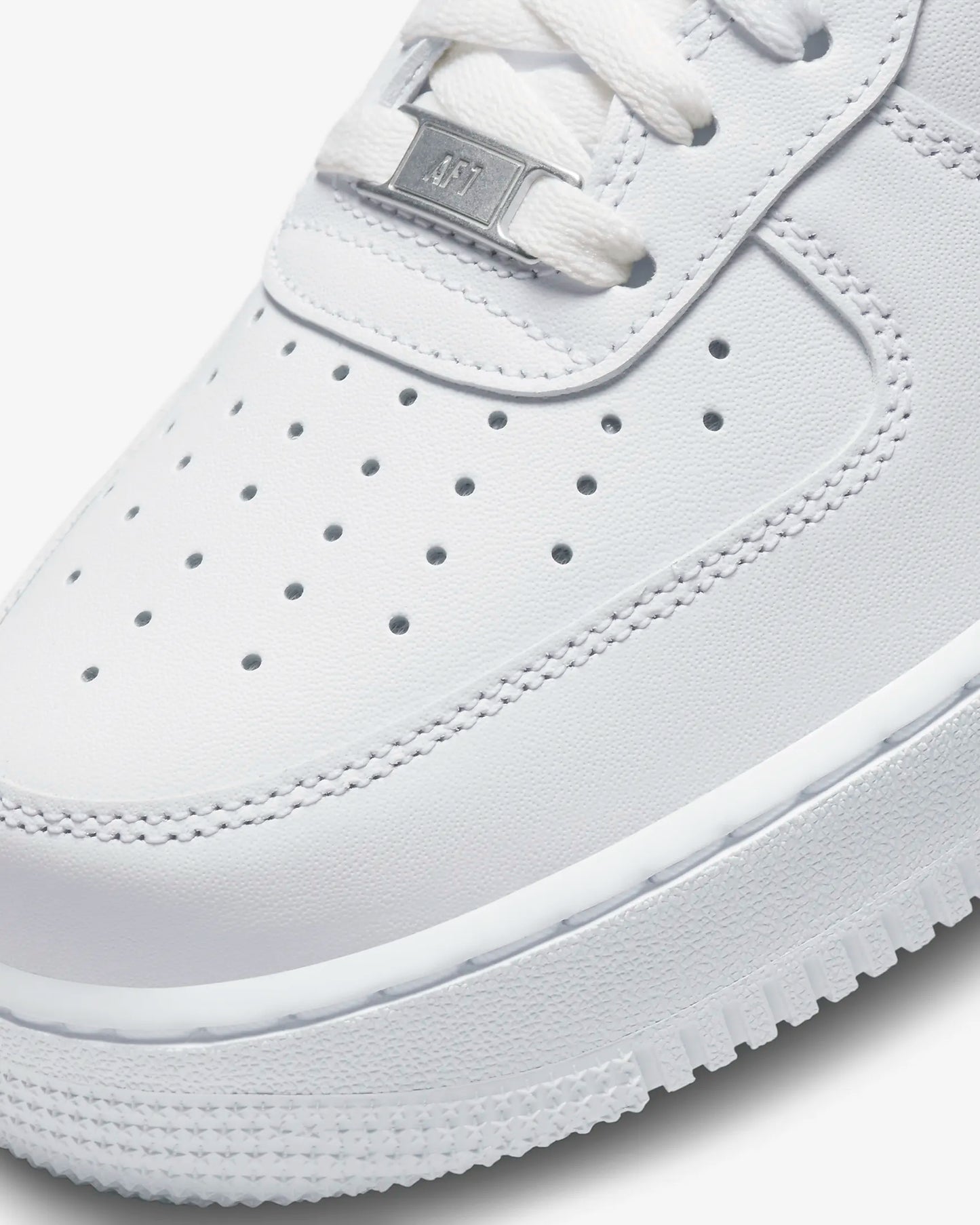 "Nike Air Force 1 '07 sneakers with durably stitched overlays and sleek design, featuring a clean, bold look and comfortable cushioned sole."